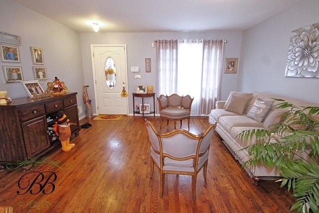 living area with wood finished floors