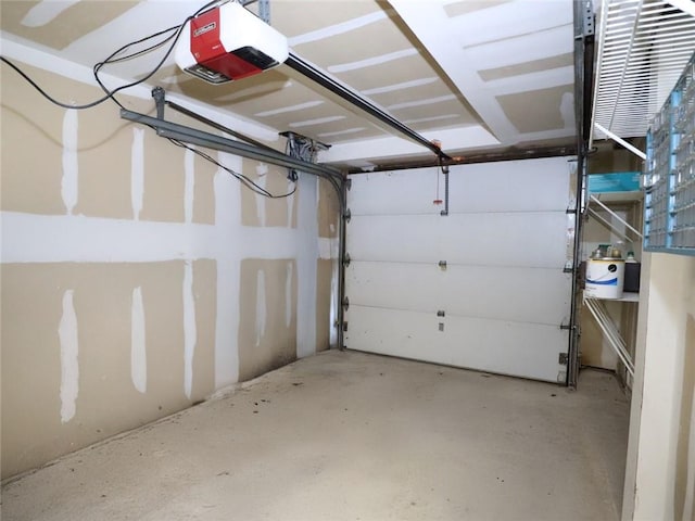 garage featuring a garage door opener