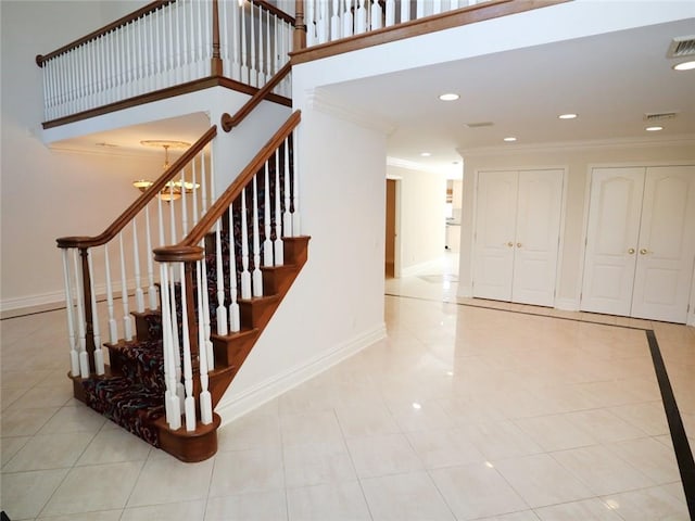 stairs featuring ornamental molding, tile patterned flooring, baseboards, and recessed lighting