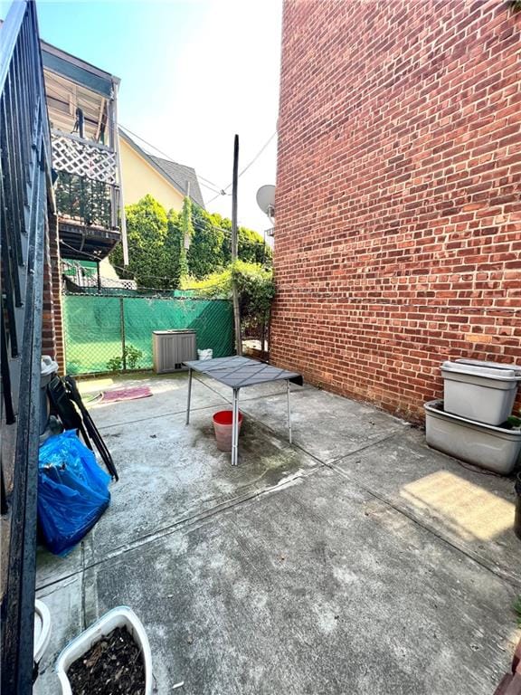 view of patio with fence