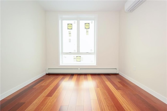 1721 W 6th St Unit 2A, Brooklyn, NY 11223 - unfurnished room with an AC wall unit, a baseboard radiator, hardwood / wood-style floors, and baseboards