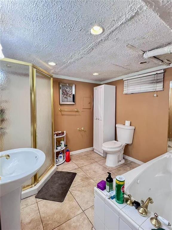 1202 E 46th St, Brooklyn, NY 11234 - bathroom featuring a stall shower, a tub with jets, tile patterned floors, and toilet
