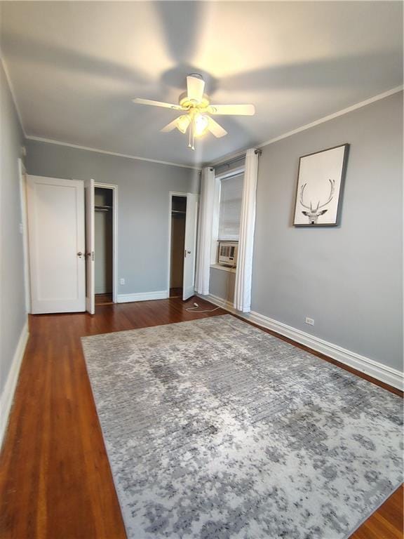2195 E 22nd St Unit 5C, Brooklyn, NY 11229 - unfurnished bedroom with baseboards, dark wood-type flooring, cooling unit, ceiling fan, and ornamental molding