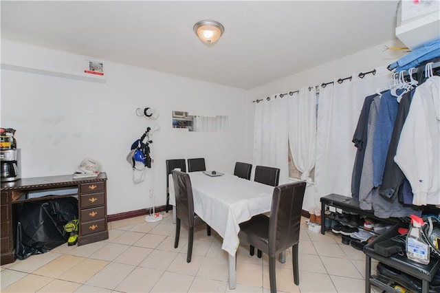 163 Boyd St, Staten Island, NY 10304 - dining area with light tile patterned flooring and baseboards