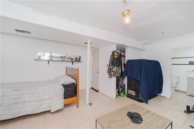 bedroom with tile patterned flooring