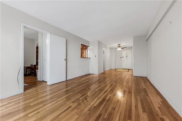1165 54th St Unit 5U, Brooklyn, NY 11234 - unfurnished living room with light wood-type flooring and a ceiling fan