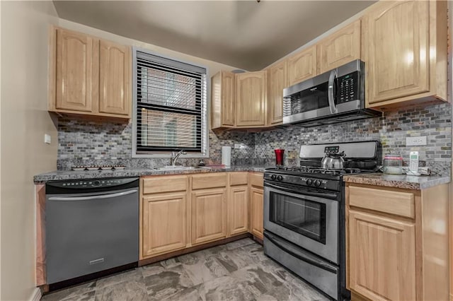 1165 54th St Unit 5U, Brooklyn, NY 11234 - kitchen with stainless steel appliances, light brown cabinets, a sink, and backsplash