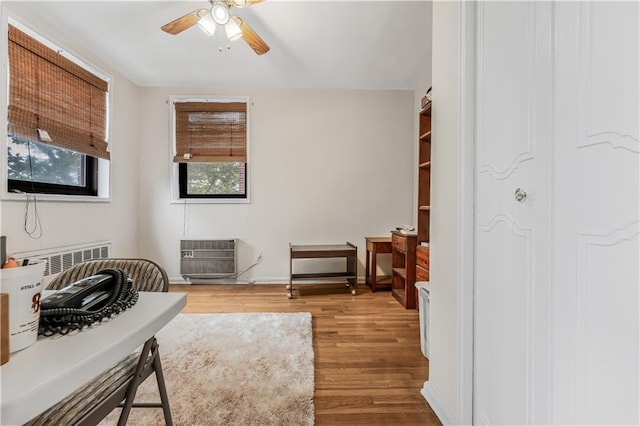 1165 54th St Unit 5U, Brooklyn, NY 11234 - sitting room with a ceiling fan, wood finished floors, and heating unit