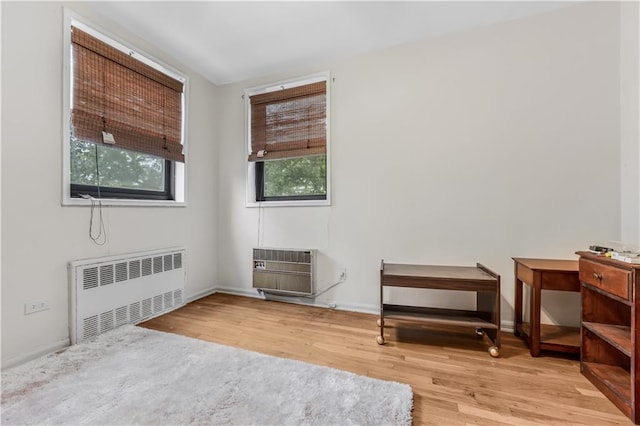 1165 54th St Unit 5U, Brooklyn, NY 11234 - sitting room with radiator, wood finished floors, heating unit, and baseboards