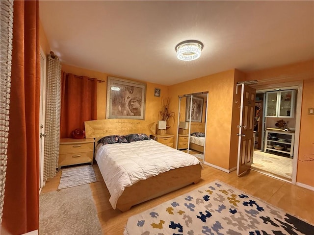1120 Banner Ave, Brooklyn, NY 11235 - bedroom with wood finished floors and baseboards