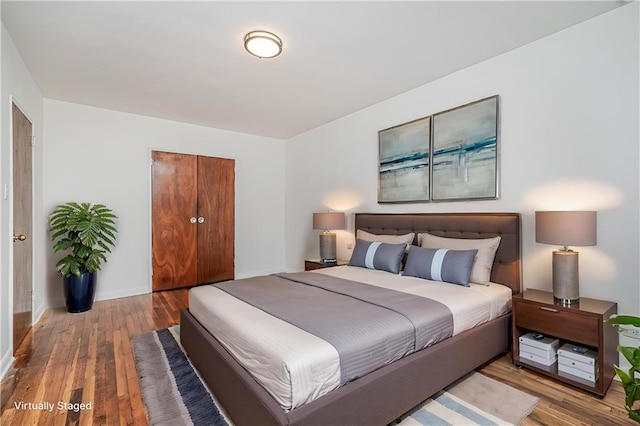 3101 Ocean Pkwy Unit 3H, Brooklyn, NY 11235 - bedroom with wood finished floors, a closet, and baseboards