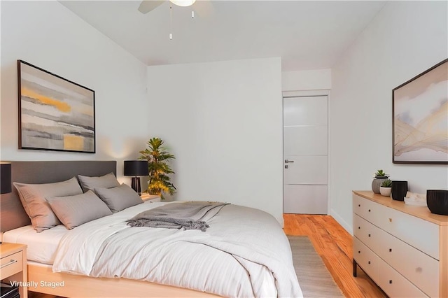 2546 E 13th St Unit A11, Brooklyn, NY 11235 - bedroom featuring light wood-style flooring and a ceiling fan