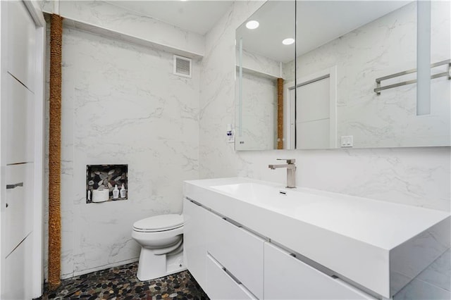2546 E 13th St Unit A11, Brooklyn, NY 11235 - bathroom featuring toilet and vanity