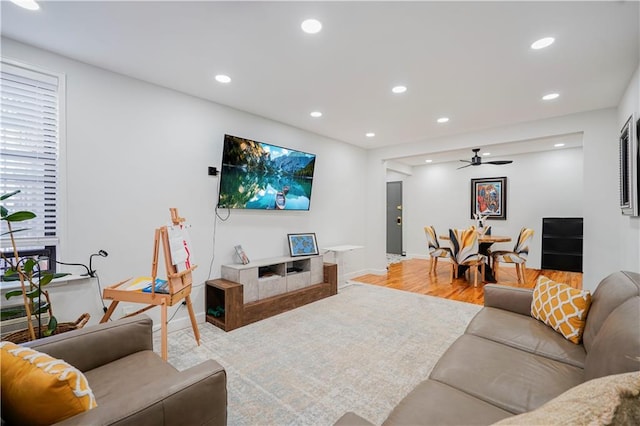 2546 E 13th St Unit A11, Brooklyn, NY 11235 - living area with wood finished floors, recessed lighting, baseboards, and a ceiling fan