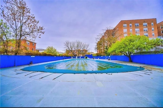 2546 E 13th St Unit A11, Brooklyn, NY 11235 - view of pool with a fenced backyard and a patio area