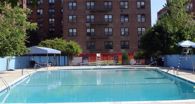 2546 E 13th St Unit A11, Brooklyn, NY 11235 - community pool featuring fence