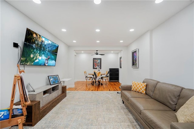 2546 E 13th St Unit A11, Brooklyn, NY 11235 - living area with recessed lighting, wood finished floors, ceiling fan, and baseboards