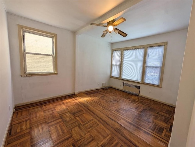 1765 W 12th St, Brooklyn, NY 11223 - spare room featuring radiator, healthy amount of natural light, ceiling fan, and baseboards