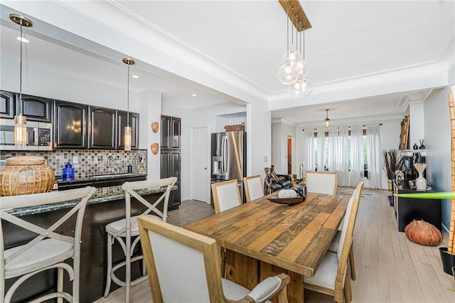 138 Wakeman Pl, Brooklyn, NY 11220 - dining space featuring ornamental molding, light wood-style flooring, and recessed lighting