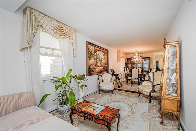167 Bay 32nd St, Brooklyn, NY 11214 - living area featuring a chandelier and baseboards