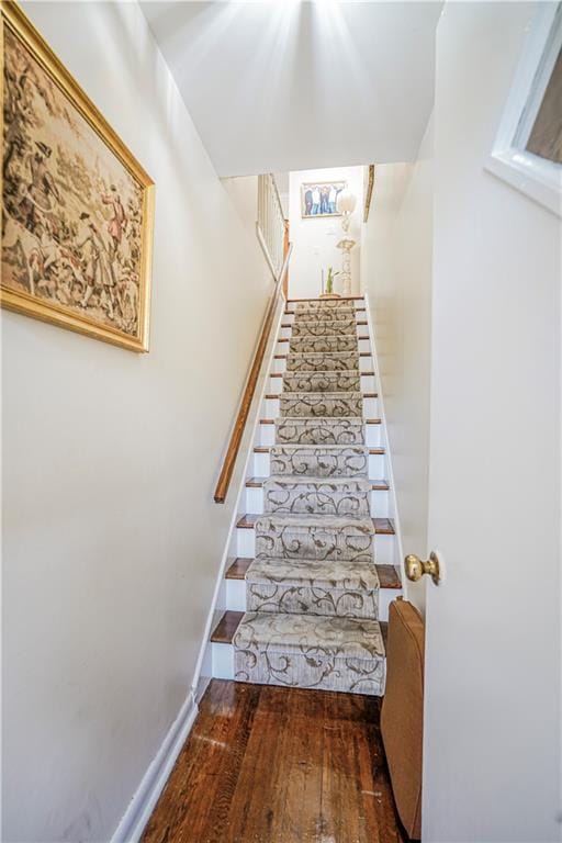 167 Bay 32nd St, Brooklyn, NY 11214 - stairway featuring wood finished floors and baseboards