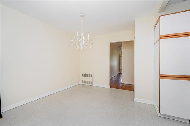 167 Bay 32nd St, Brooklyn, NY 11214 - empty room with a chandelier and baseboards