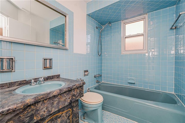 167 Bay 32nd St, Brooklyn, NY 11214 - bathroom with  shower combination, tile walls, vanity, and tile patterned flooring