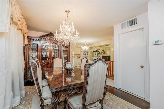 167 Bay 32nd St, Brooklyn, NY 11214 - dining space with a chandelier and wood finished floors