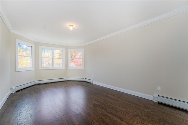 spare room featuring baseboard heating, dark wood-type flooring, baseboards, and ornamental molding