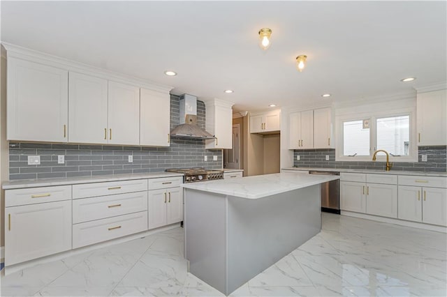 kitchen with wall chimney exhaust hood, stainless steel appliances, light marble finish flooring, decorative backsplash, and recessed lighting