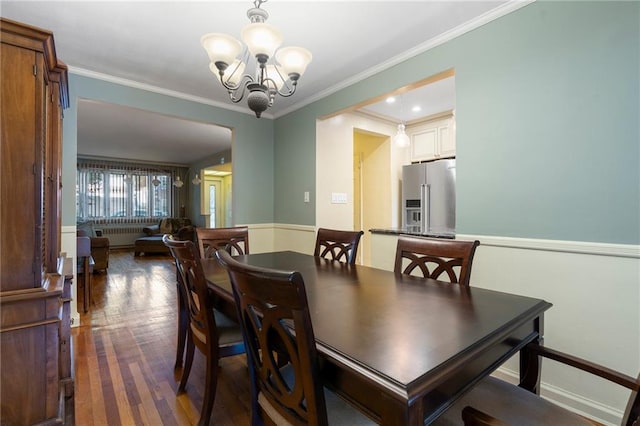 2472 Stuart St, Brooklyn, NY 11229 - dining room featuring dark wood-style flooring, a chandelier, and ornamental molding