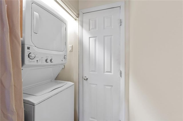 2472 Stuart St, Brooklyn, NY 11229 - laundry area with stacked washing machine and dryer