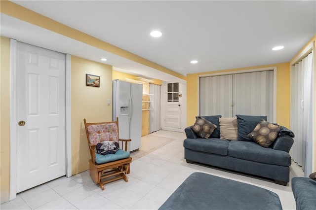 2472 Stuart St, Brooklyn, NY 11229 - living area with light tile patterned floors and recessed lighting