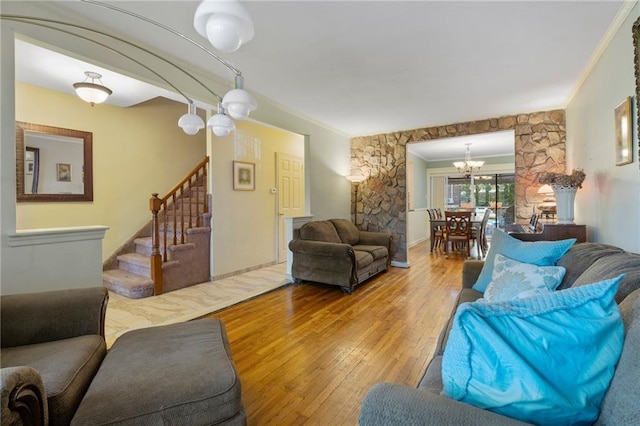 2472 Stuart St, Brooklyn, NY 11229 - living room with ornamental molding, a chandelier, hardwood / wood-style flooring, and stairs