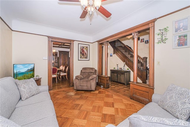 living area with a ceiling fan