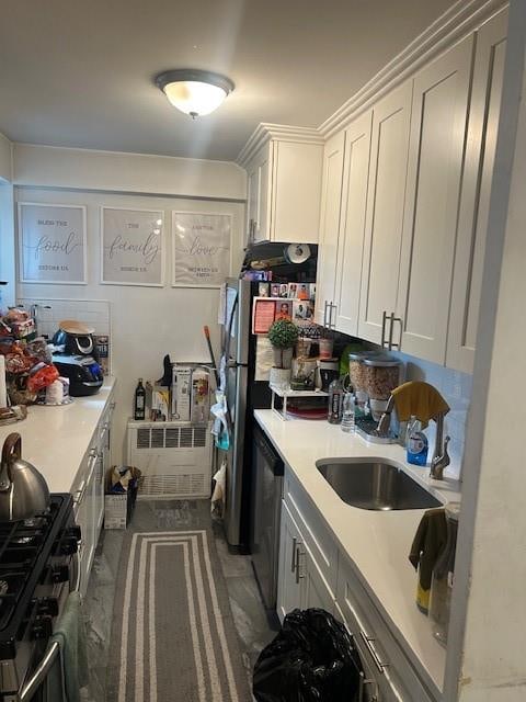 1065 Vermont St Unit 3H, Brooklyn, NY 11207 - kitchen with gas range oven, light countertops, white cabinets, and dishwasher