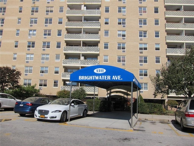 1311 Brightwater Ave Unit 6G, Brooklyn, NY 11235 - view of apartment building / complex with uncovered parking