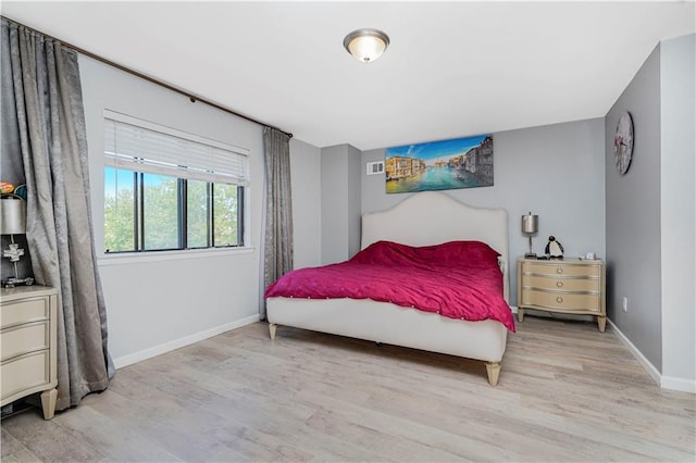 131 Stonegate Dr Unit 1, Staten Island, NY 10304 - bedroom featuring light wood-style floors and baseboards