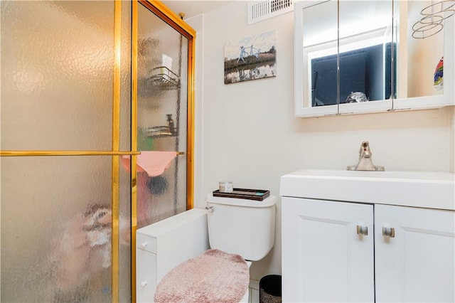 131 Stonegate Dr Unit 1, Staten Island, NY 10304 - bathroom with vanity, a shower stall, and toilet