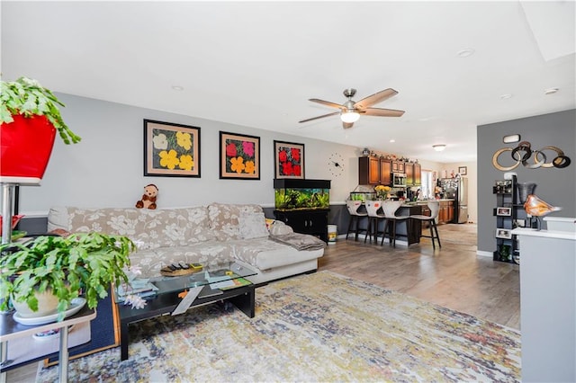 131 Stonegate Dr Unit 1, Staten Island, NY 10304 - living area with ceiling fan and wood finished floors
