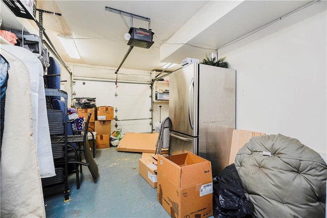 131 Stonegate Dr Unit 1, Staten Island, NY 10304 - garage with a garage door opener and freestanding refrigerator