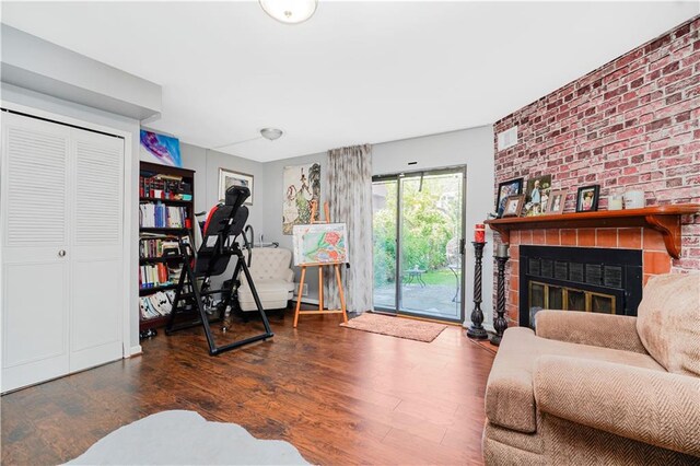 131 Stonegate Dr Unit 1, Staten Island, NY 10304 - office space with wood finished floors, a brick fireplace, and brick wall