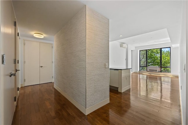 hall with hardwood / wood-style floors and recessed lighting
