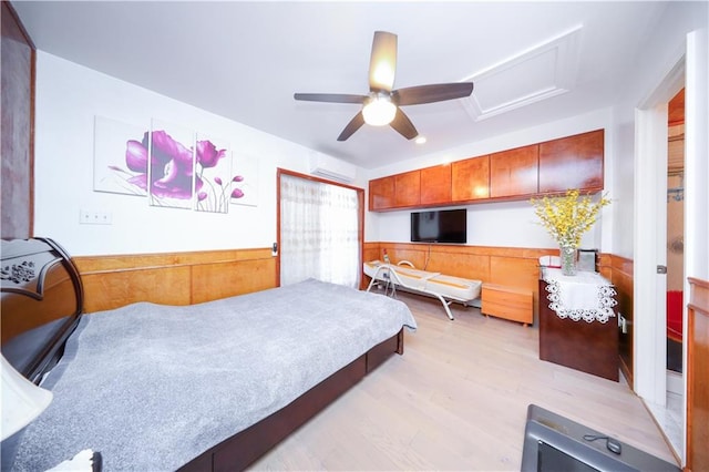 1820 73rd St Unit 3A, Brooklyn, NY 11204 - bedroom with a wall mounted AC, attic access, light wood-style floors, a ceiling fan, and wainscoting
