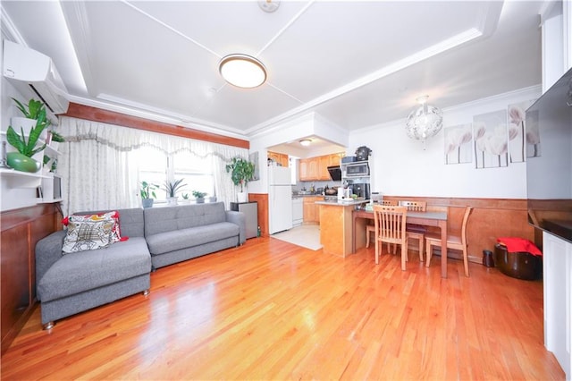 1820 73rd St Unit 3A, Brooklyn, NY 11204 - living room featuring light wood finished floors, an AC wall unit, and crown molding
