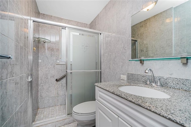 1519 71st St, Brooklyn, NY 11228 - full bathroom with tile walls, vanity, toilet, and a stall shower