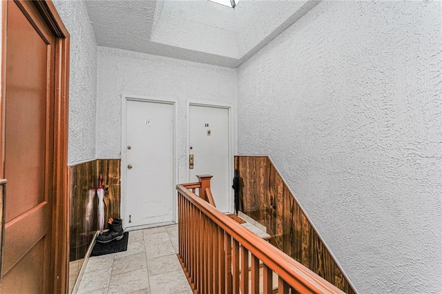 1519 71st St, Brooklyn, NY 11228 - foyer featuring a textured wall and a textured ceiling