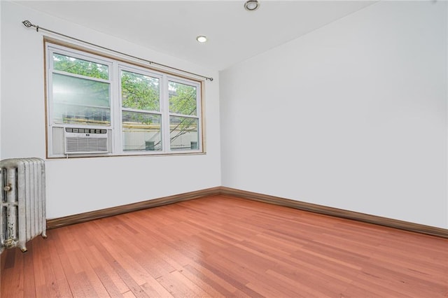 1519 71st St, Brooklyn, NY 11228 - spare room with radiator, light wood-style flooring, healthy amount of natural light, baseboards, and recessed lighting