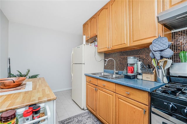 1519 71st St, Brooklyn, NY 11228 - kitchen with freestanding refrigerator, stainless steel gas range, extractor fan, a sink, and backsplash