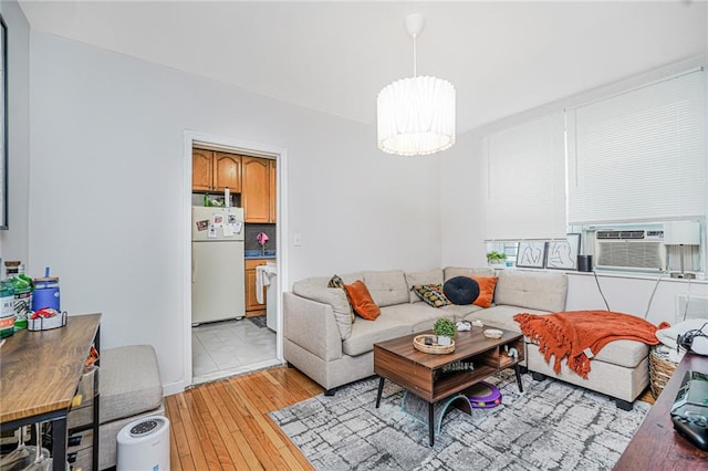 1519 71st St, Brooklyn, NY 11228 - living room with light wood-style flooring and cooling unit